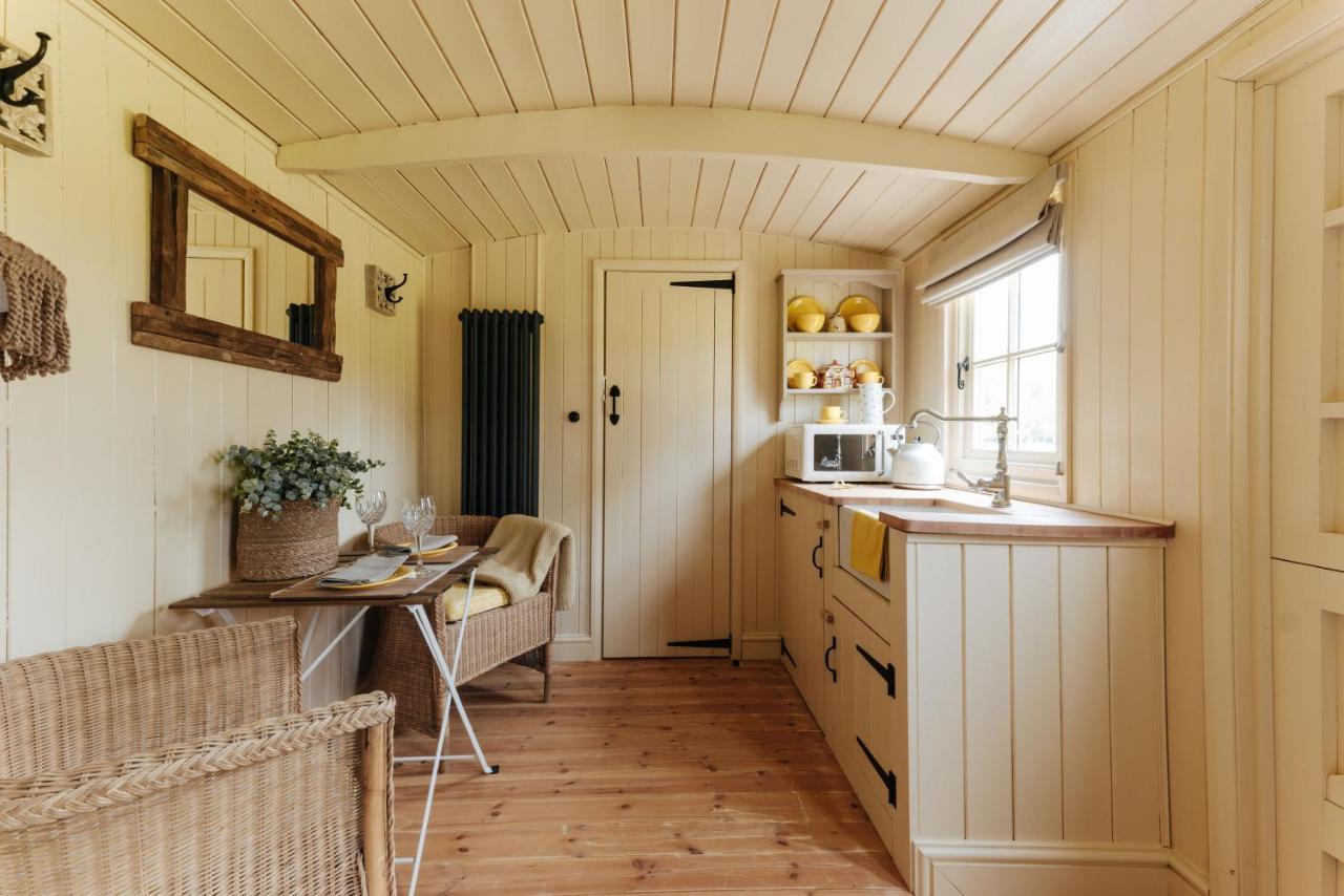 The Shepherds Huts & The Well At Ormesby Manor